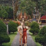 couple-standing-on-a-temple-background-2024-12-06-16-05-01-utc