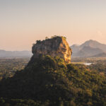 Sigiriya rock also known as Lion Rock at golden light of sunset. Beautiful landscape in Sri lanka.