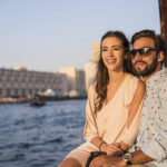 Romantic couple on boat at Dubai marina, United Arab Emirates