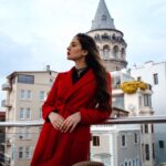 woman-standing-at-the-roof-cafe-with-istanbul-on-b-2023-11-27-05-25-36-utc