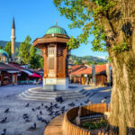 Bascarsija square with Sebilj wooden fountain in Old Town Sarajevo, capital city of Bosnia and Herzegovina