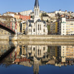 ancient; apartment; architecture; bank; basilica; blue; bridge; building; cathedral; catholic; church; city; cityscape; clear; cloud; cloudscape; colorful; district; embankment; europe; fourviere; france; hill; house; idyllic; landmark; lyon; medieval; old; panorama; panoramic; postcard; reflection; river; riverbank; riverside; saone; scene; sky; stitched; urban; vieux; water
