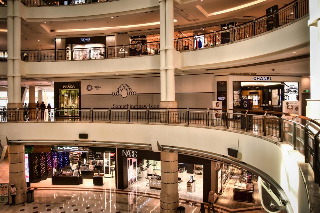 Explore the luxurious interior of a shopping mall in Kuala Lumpur, Malaysia, featuring top brands.