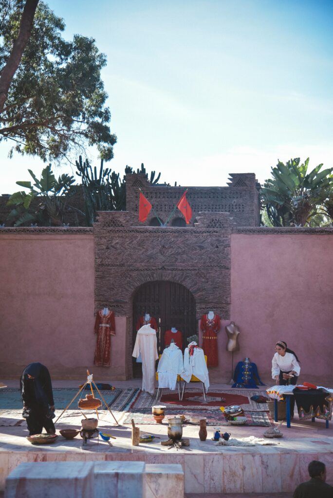Vibrant Moroccan street market with traditional attire in Agadir, Morocco.
