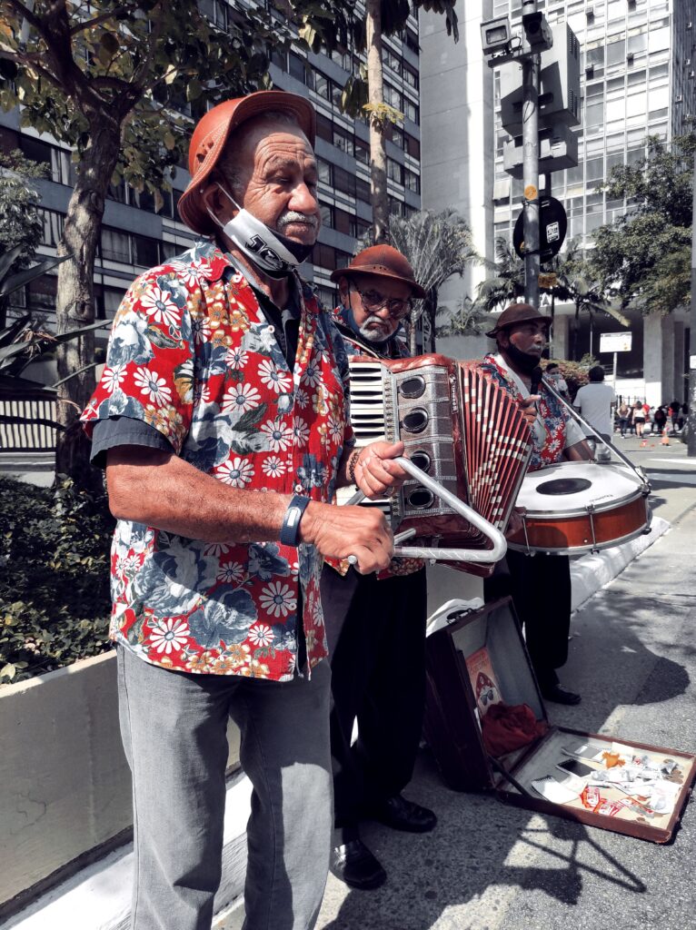 Street musicians play lively tunes on Avenida Paulista, capturing São Paulo's vibrant culture.